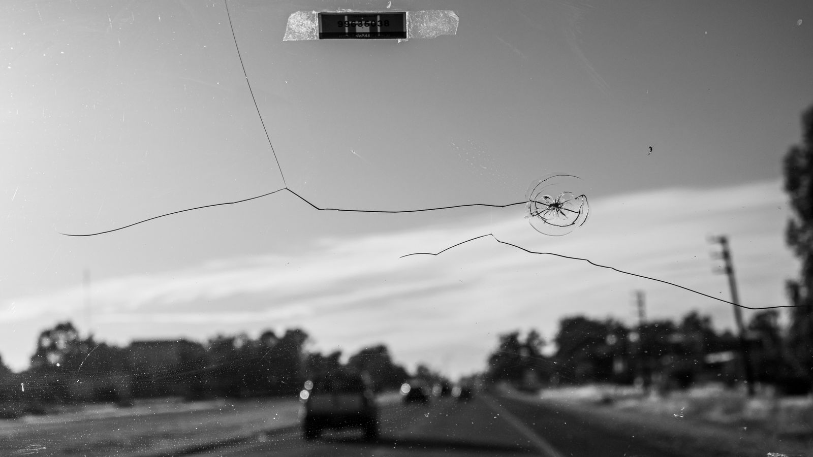 Cracked automobile windshield viewed from inside the vehicle